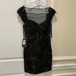 Black la femme mini dress